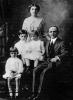 Прикрепленное изображение: Revson Family. Samuel Morris Revson c.1874-1949 and his wife Nettie Leah (Janette) Revson, nee Weiss, 1884-1933 with their three children from left to right Hyman Charles Revson, Joseph Revson 1905-1971 and Martin Elliot Rev.jpg